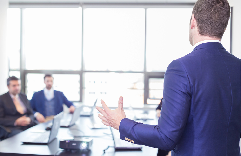 Executive speaking to a board of directors
